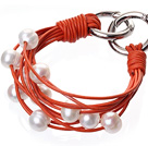 天然白色珍珠手链 配橘色皮绳 多层皮绳款